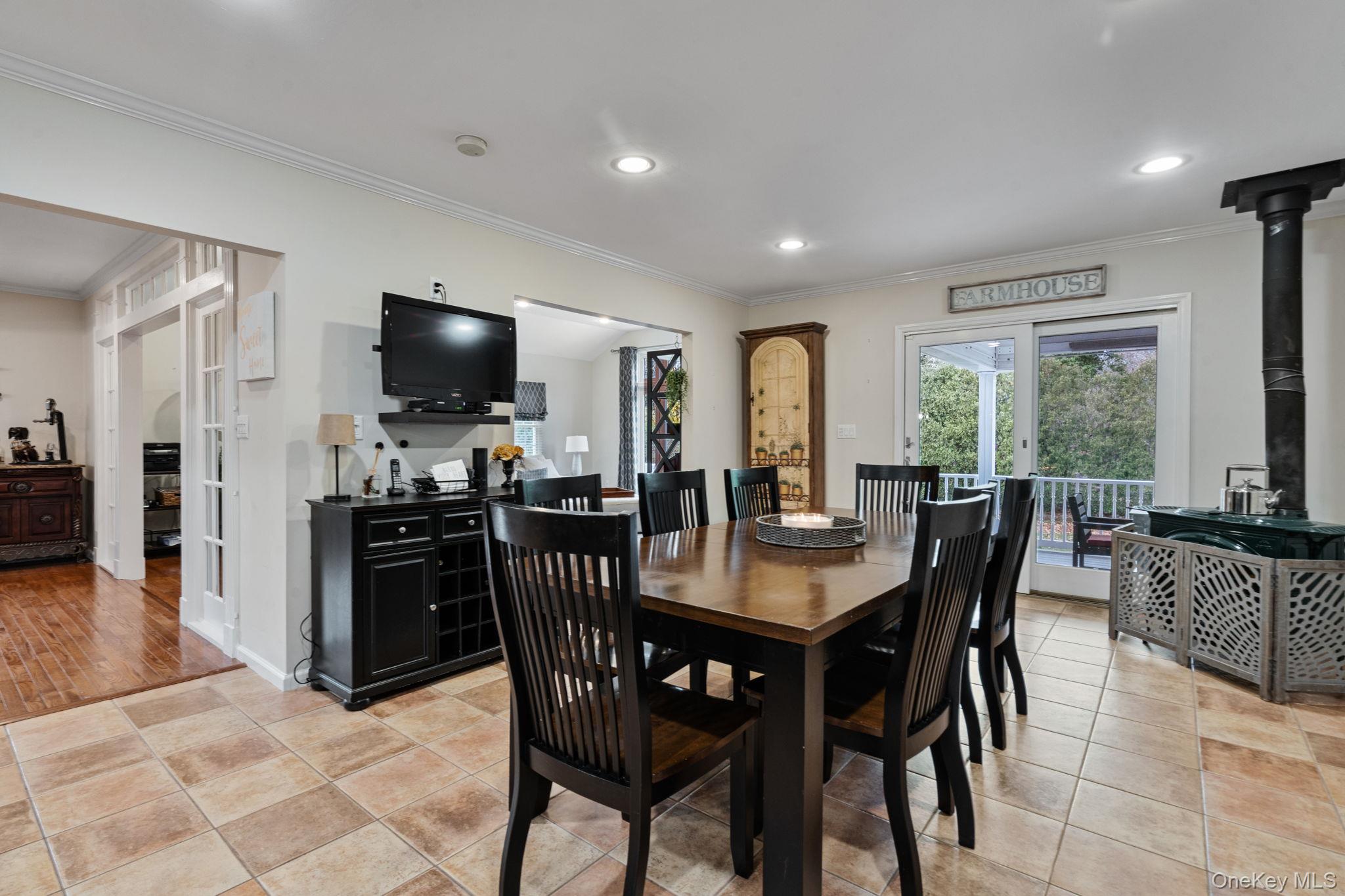 6 Daniel Way Setauket, NY 11733 - Photo 19 of 41 a view of a dining room with furniture window and outside view