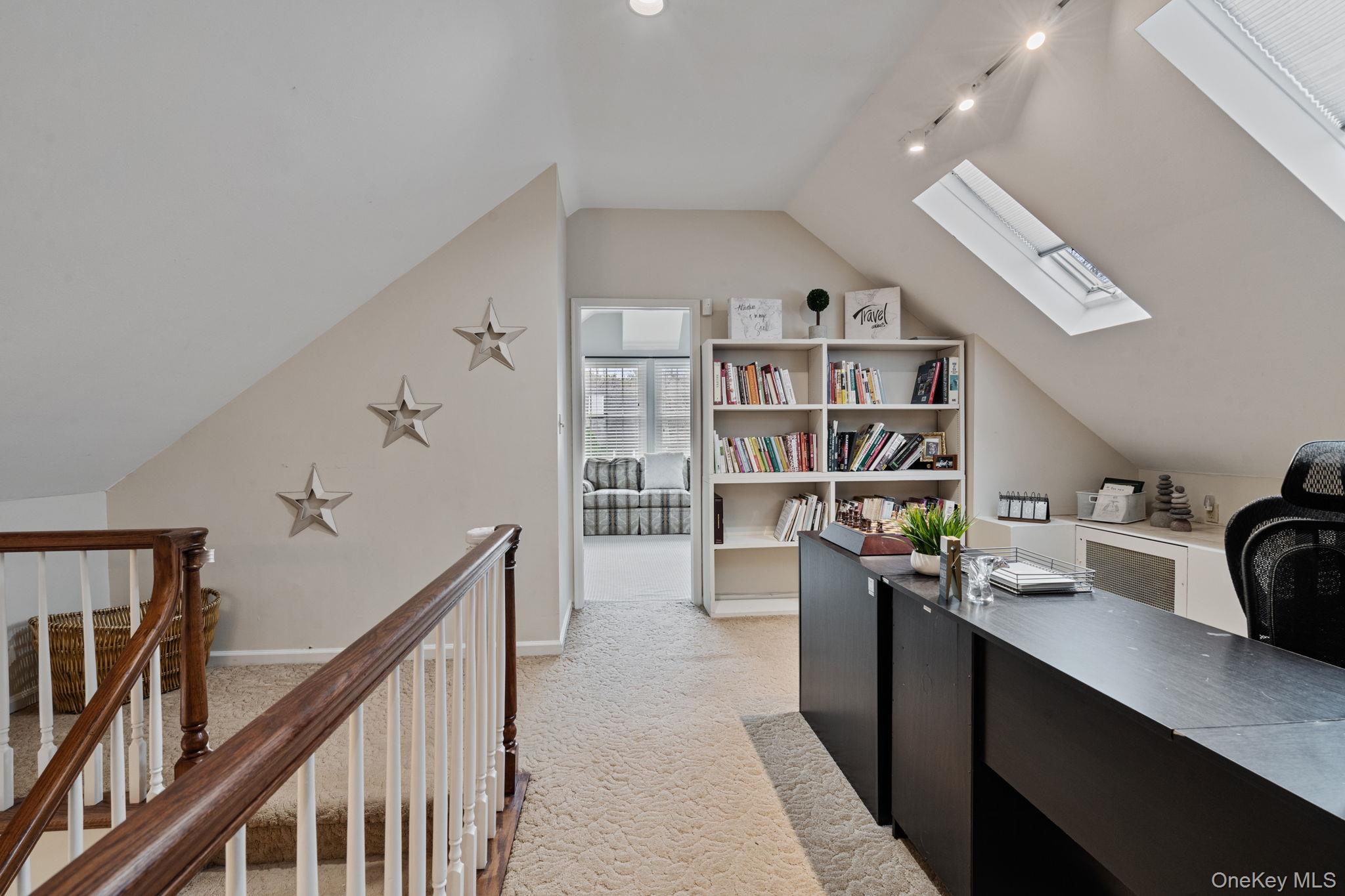 6 Daniel Way Setauket, NY 11733 - Photo 31 of 41 Office area featuring vaulted ceiling, light carpet, a skylight, and rail lighting