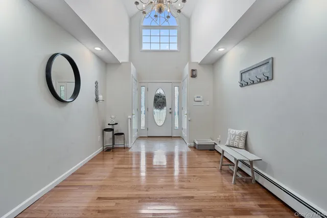 a view of entryway with wooden floor