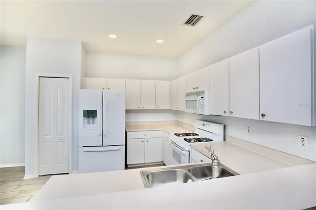 $355,000 | 24421 Breezy Oak Court, Lutz, FL 33559