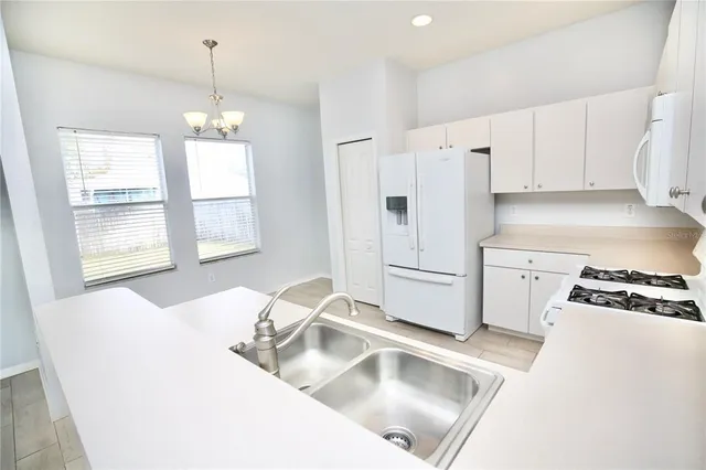 $355,000 | 24421 Breezy Oak Court, Lutz, FL 33559