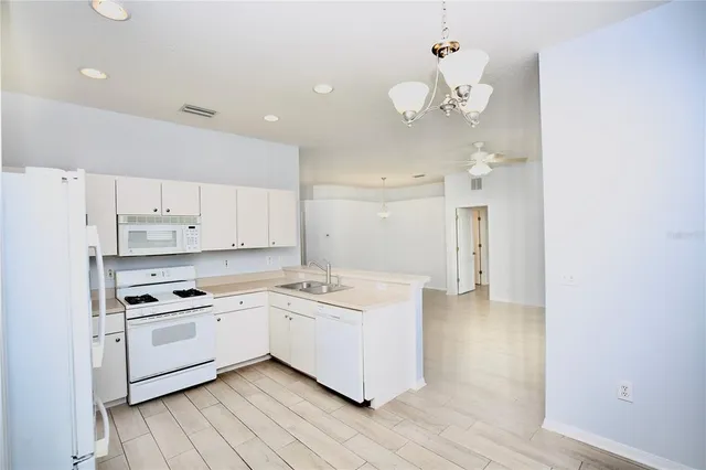 $355,000 | 24421 Breezy Oak Court, Lutz, FL 33559