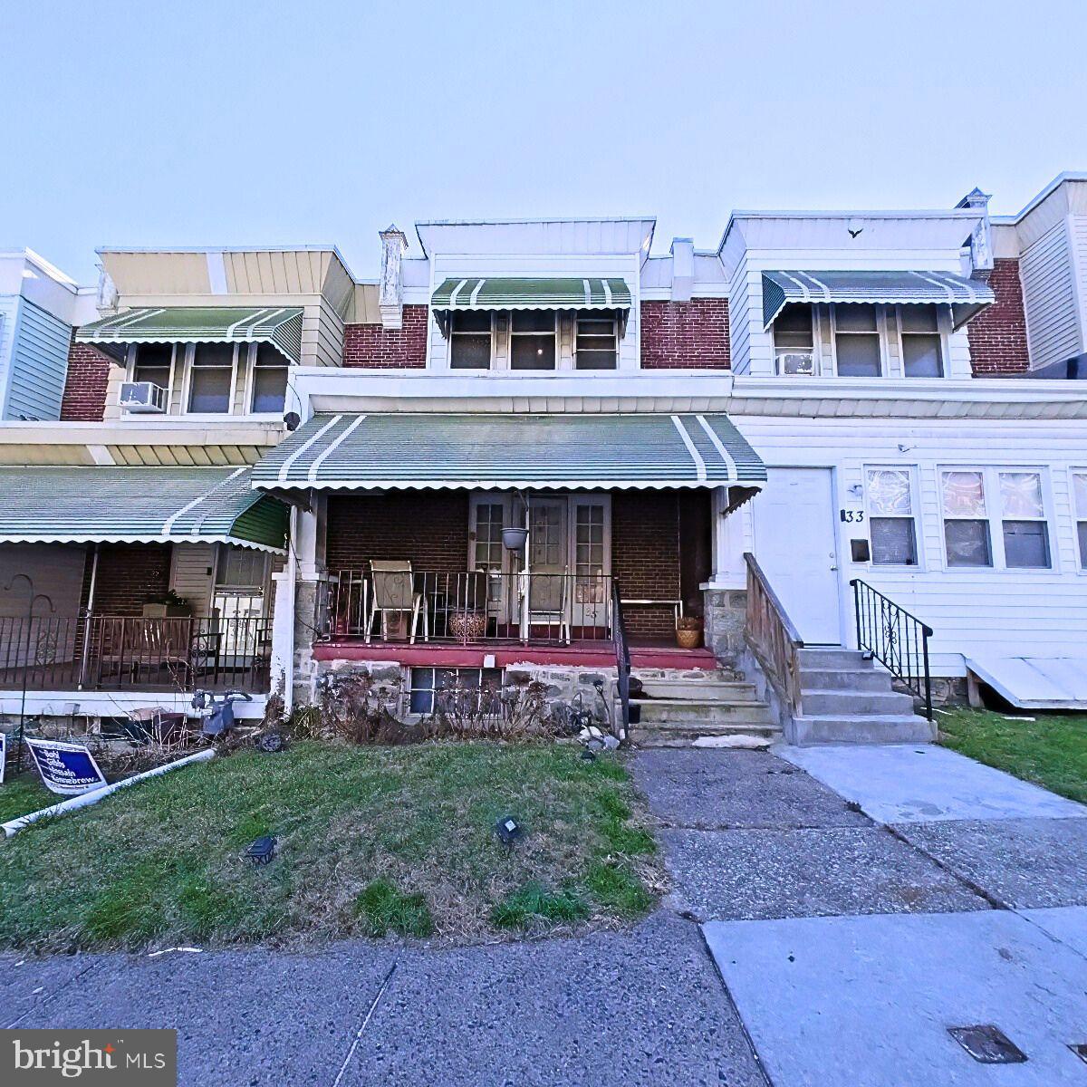 a front view of house with outdoor space