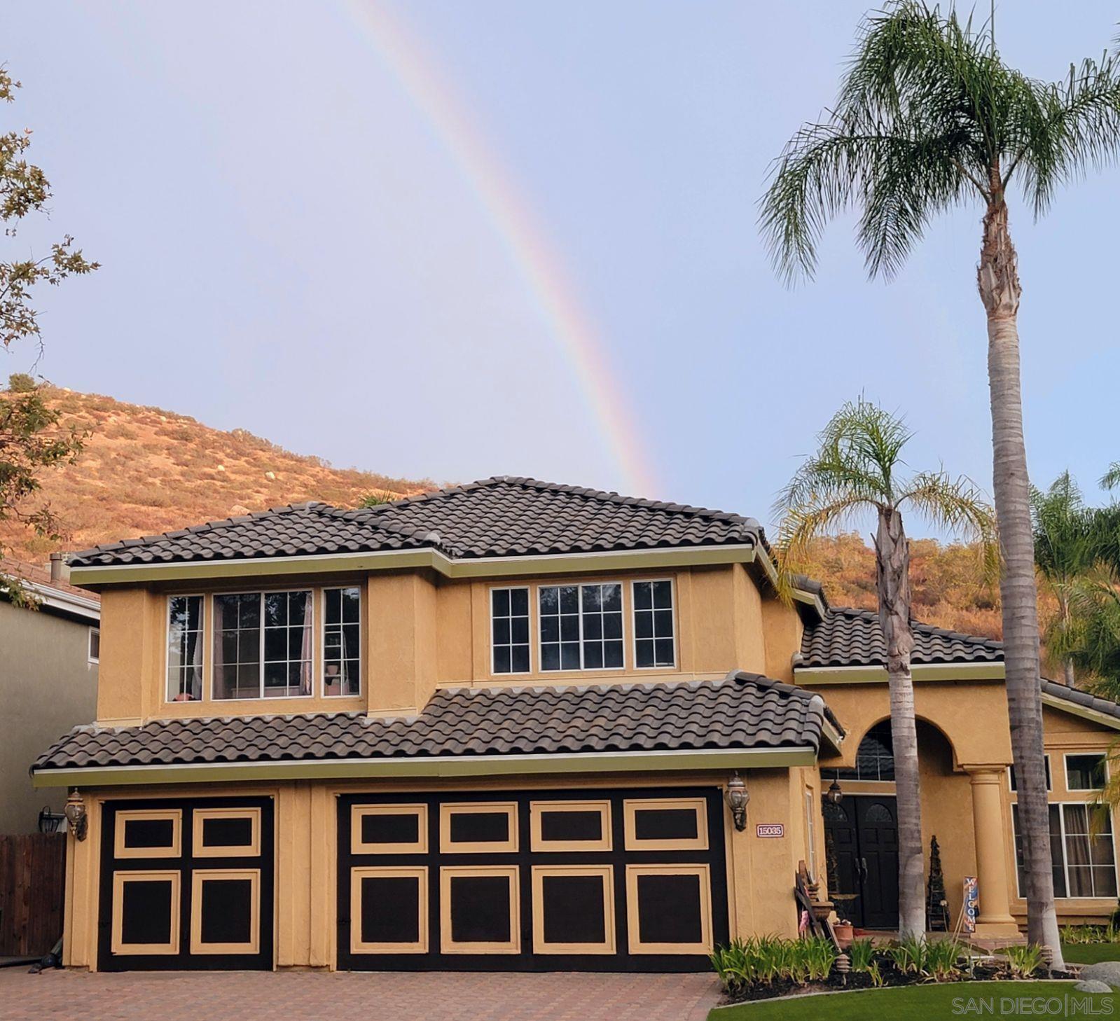 15035 Gaen Road Poway, CA 92064 - Photo 54 of 55 a front view of a house with a palm tree