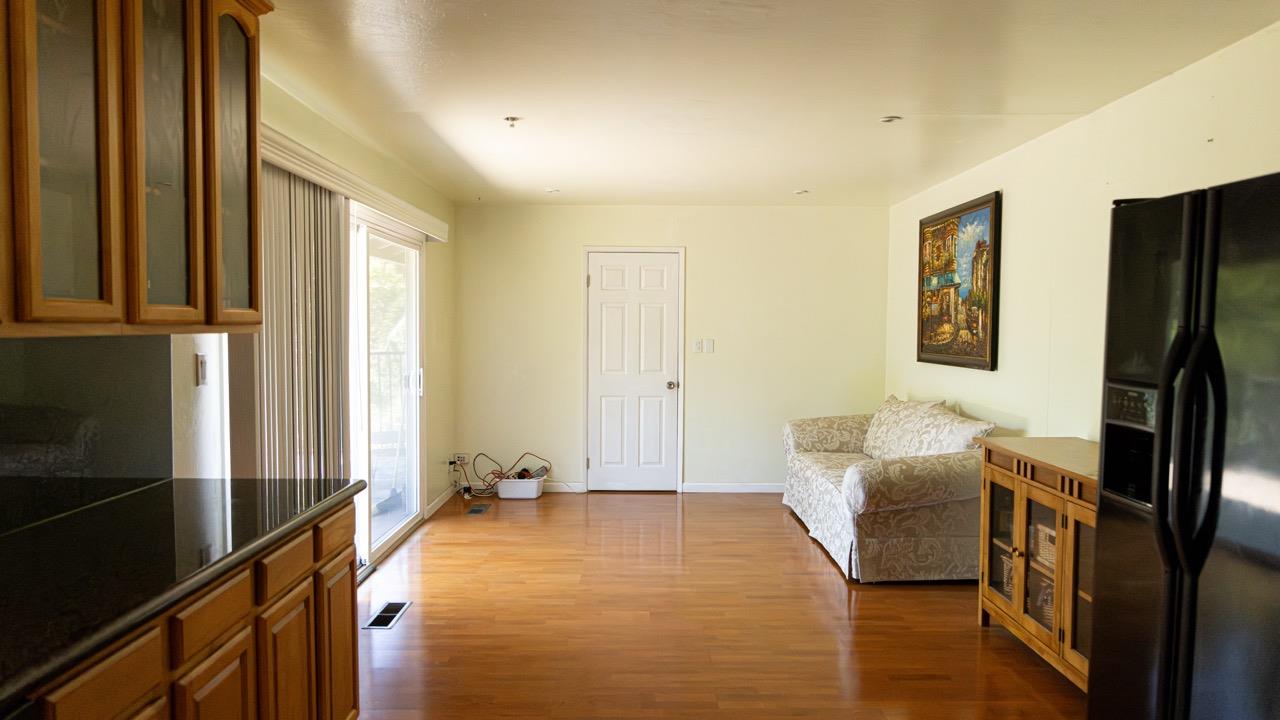 108 Stein Way Orinda, CA 94563 - Photo 25 of 40 a bedroom with a bed and wooden floor