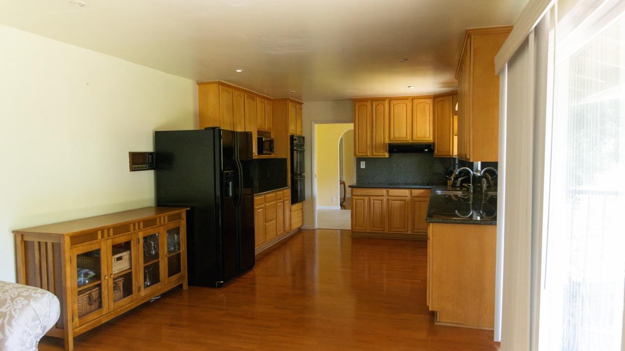 108 Stein Way Orinda, CA 94563 - Photo 26 of 40 a kitchen with stainless steel appliances a refrigerator and a cabinets