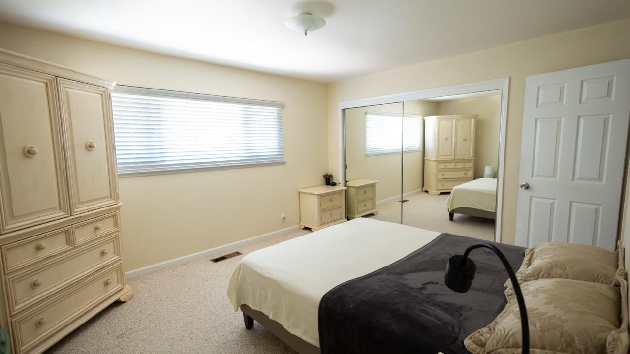 108 Stein Way Orinda, CA 94563 - Photo 31 of 40 a bedroom with a bed and a window