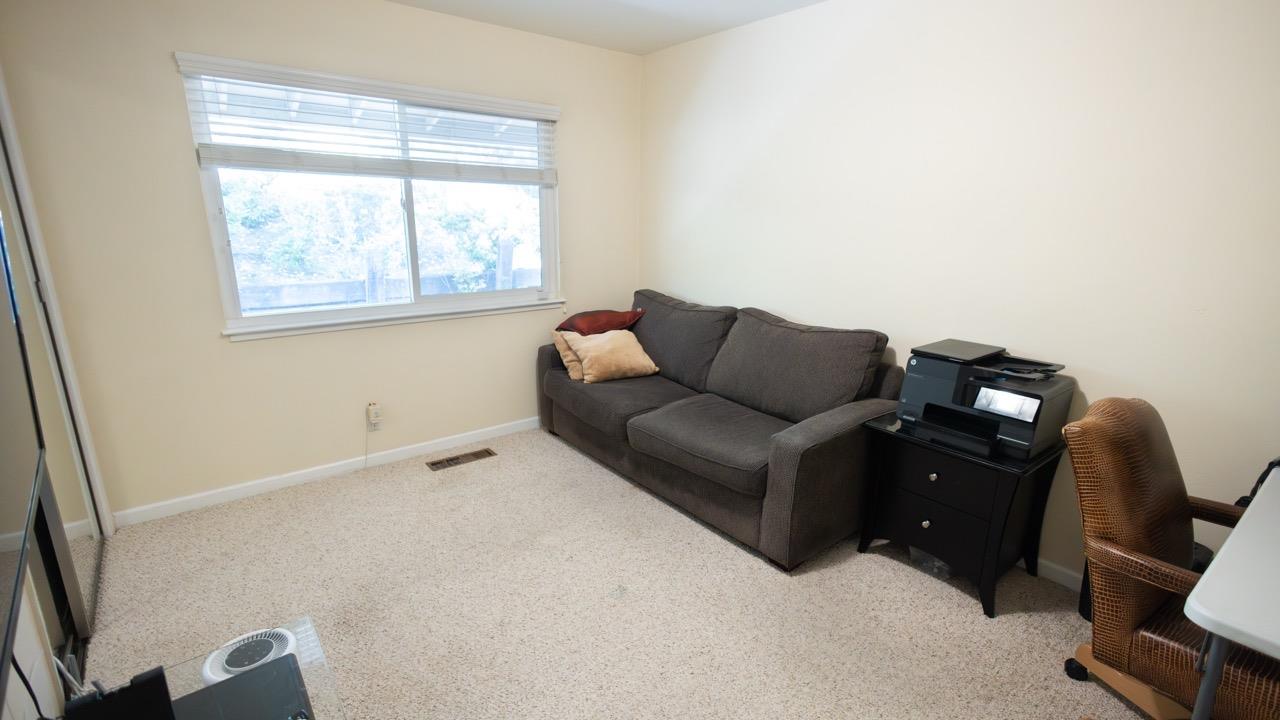 108 Stein Way Orinda, CA 94563 - Photo 33 of 40 a living room with furniture and a window