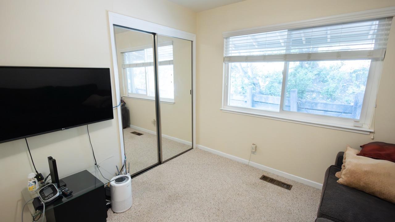 108 Stein Way Orinda, CA 94563 - Photo 34 of 40 a room with window and a flat screen tv