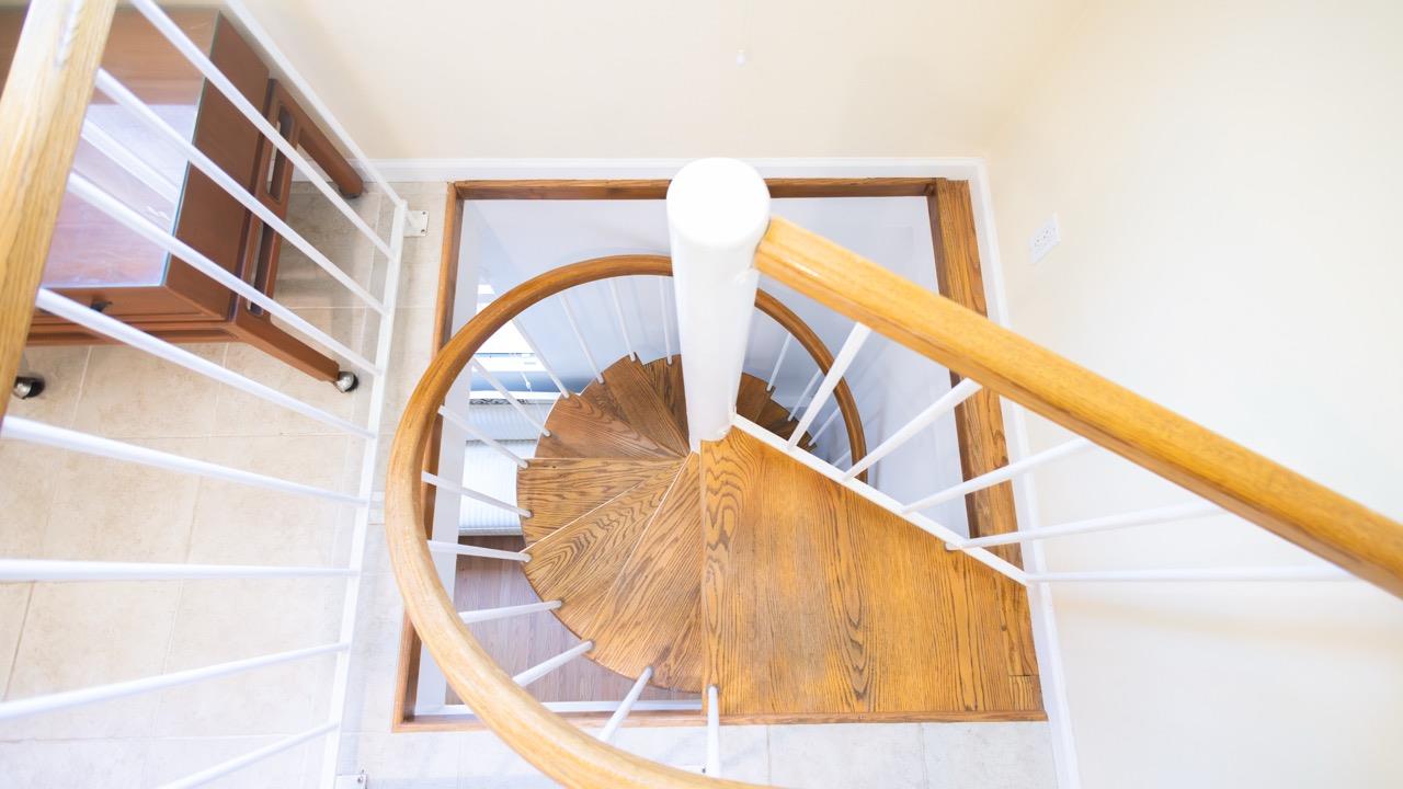 108 Stein Way Orinda, CA 94563 - Photo 38 of 40 a view of staircase with white walls and a window