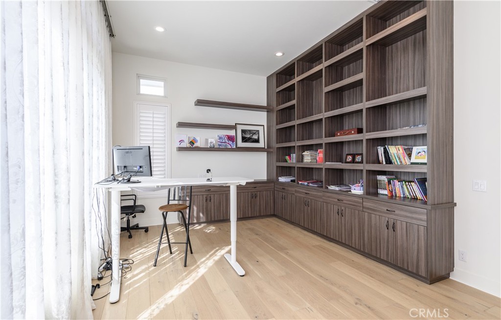 59 Dorado Irvine, CA 92618 - Photo 19 of 66 a kitchen with a cabinets and chairs in it