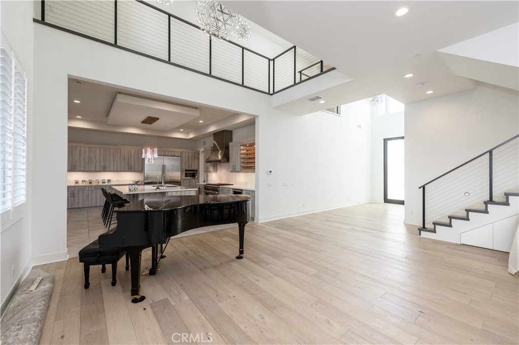 59 Dorado Irvine, CA 92618 - Photo 2 of 66 a living room with stainless steel appliances kitchen island a table and chairs