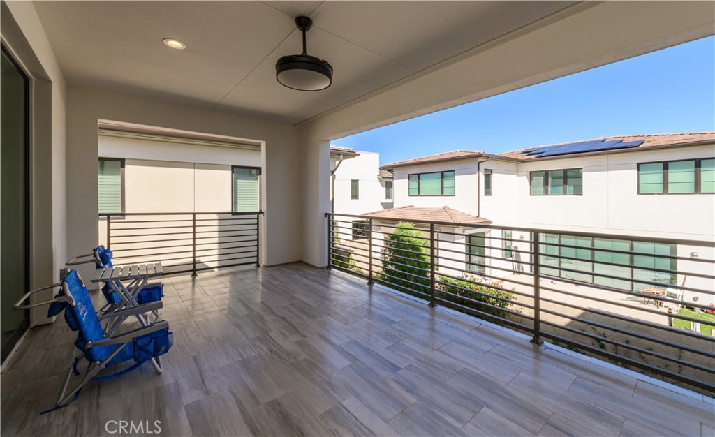 59 Dorado Irvine, CA 92618 - Photo 26 of 66 a view of a house with wooden deck and furniture