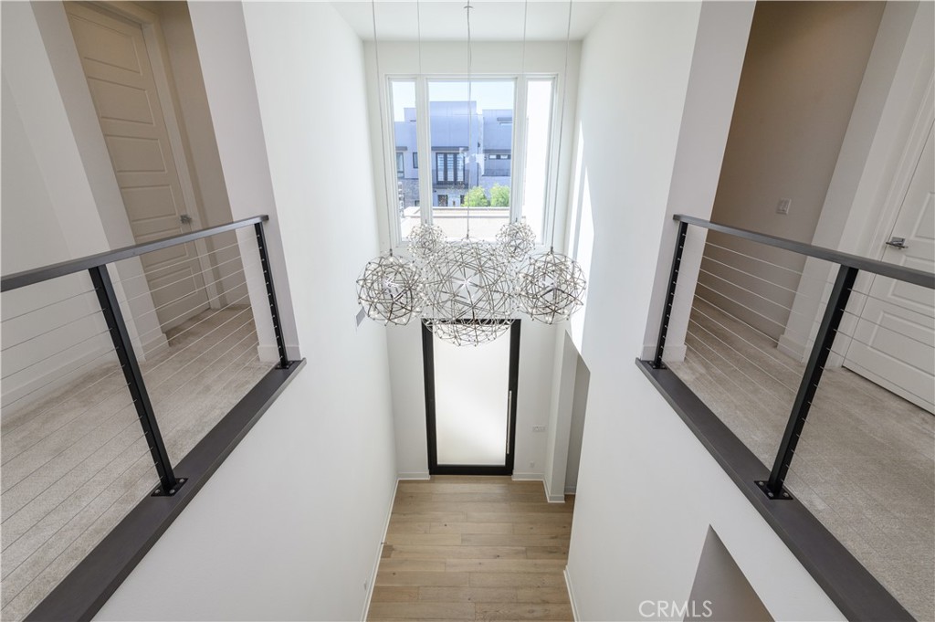 59 Dorado Irvine, CA 92618 - Photo 27 of 66 a view of an entryway with wooden floor and staircase