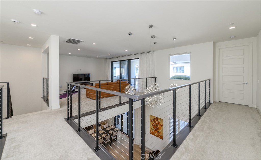 59 Dorado Irvine, CA 92618 - Photo 28 of 66 a view of a hallway with workspace