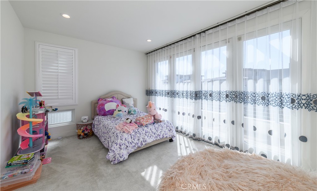59 Dorado Irvine, CA 92618 - Photo 30 of 66 a bedroom with a bed and a window