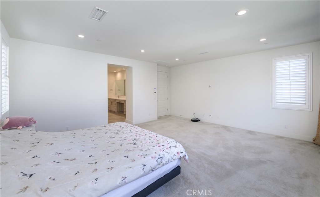 59 Dorado Irvine, CA 92618 - Photo 36 of 66 a bedroom with a bed and a window