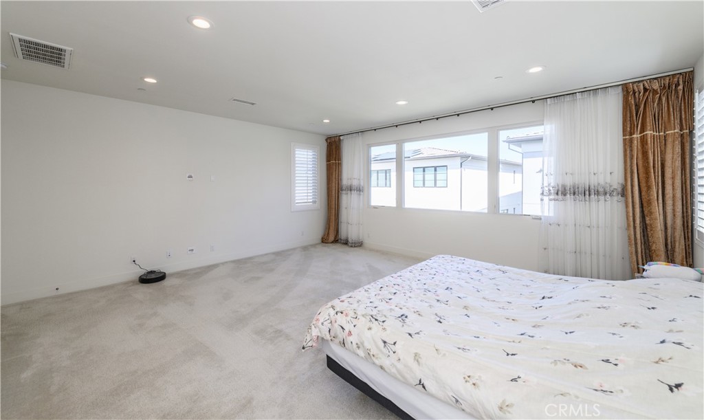 59 Dorado Irvine, CA 92618 - Photo 37 of 66 a bedroom with a bed and a window