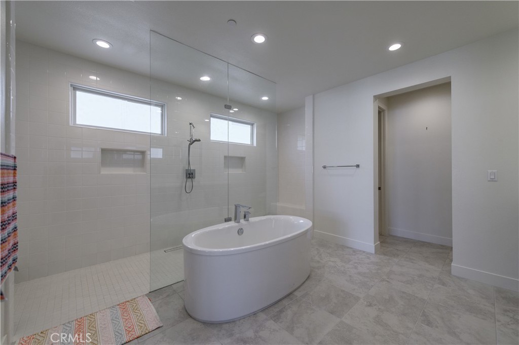 59 Dorado Irvine, CA 92618 - Photo 41 of 66 a bathroom with a bathtub and shower