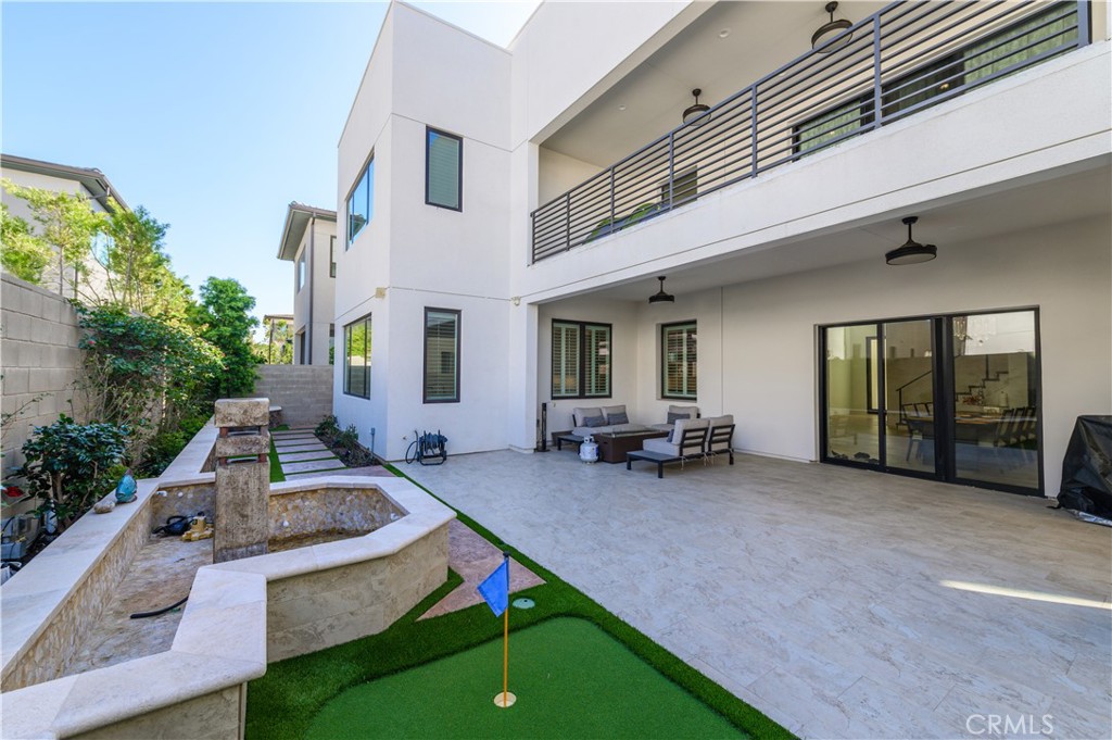 59 Dorado Irvine, CA 92618 - Photo 46 of 66 a view of a house with backyard porch and sitting area