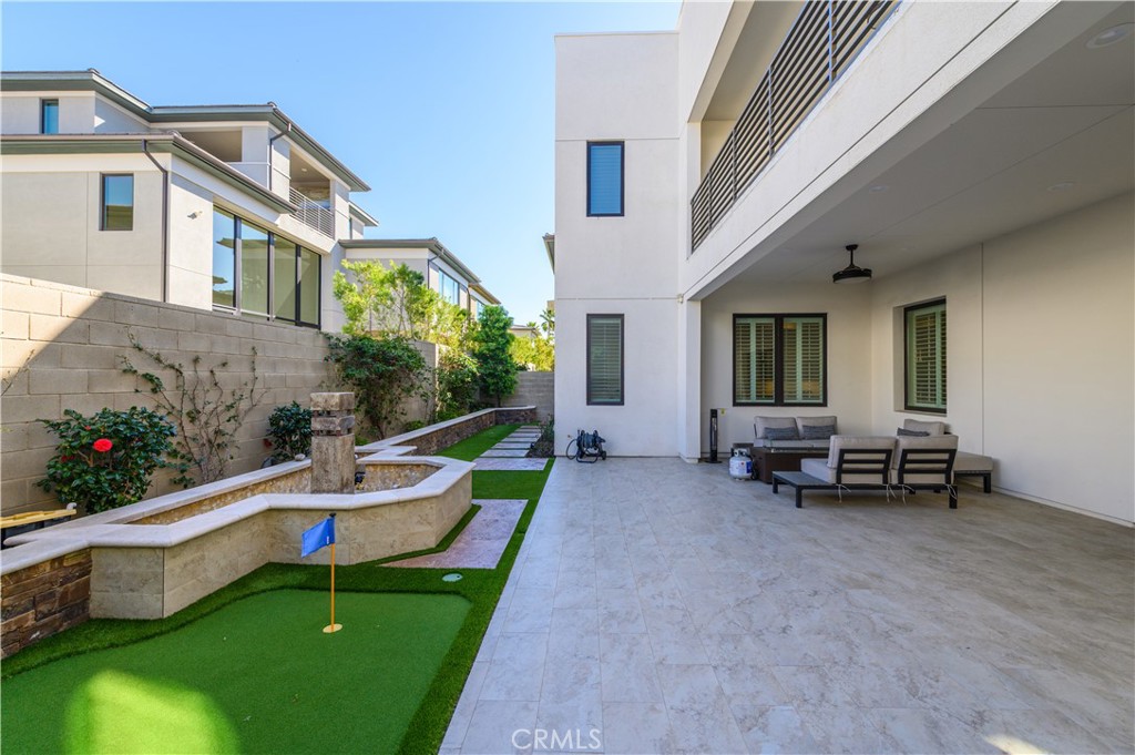 59 Dorado Irvine, CA 92618 - Photo 47 of 66 a view of a house with backyard sitting area and garden