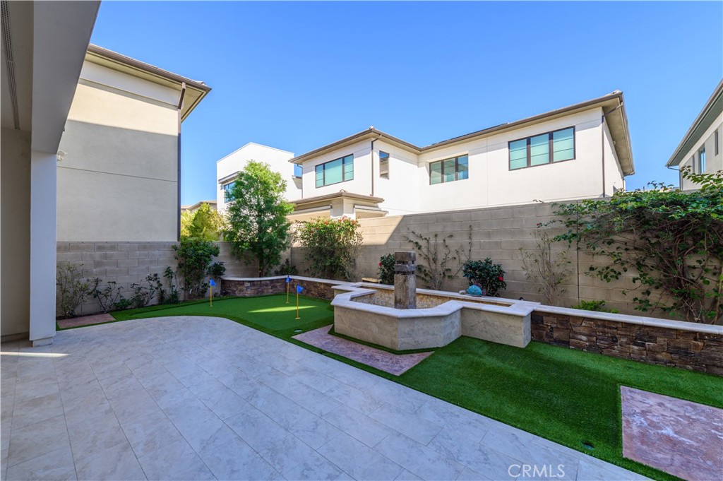 59 Dorado Irvine, CA 92618 - Photo 50 of 66 a view of house with outdoor space and backyard
