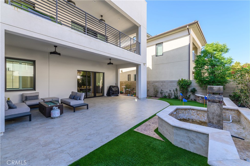 59 Dorado Irvine, CA 92618 - Photo 51 of 66 a view of an house with backyard porch and furniture