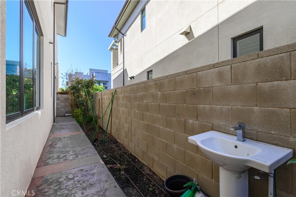 59 Dorado Irvine, CA 92618 - Photo 53 of 66 a bathroom with a sink and potted plants
