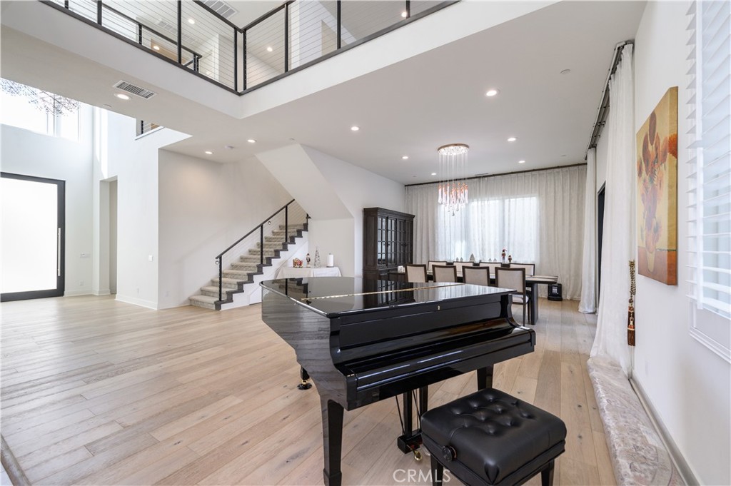 59 Dorado Irvine, CA 92618 - Photo 10 of 66 a room with lots of furniture and a wooden floor