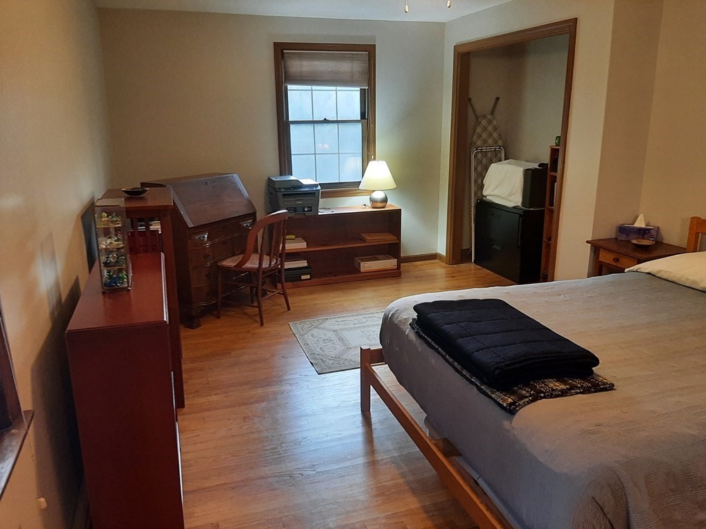 27 Elf Hill Road Amherst, MA 01002 - Photo 17 of 22 a living room with furniture and a window