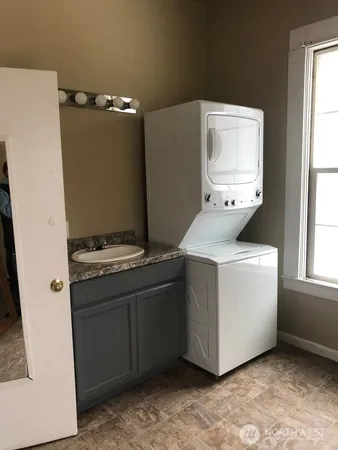 a view of an empty room with a window