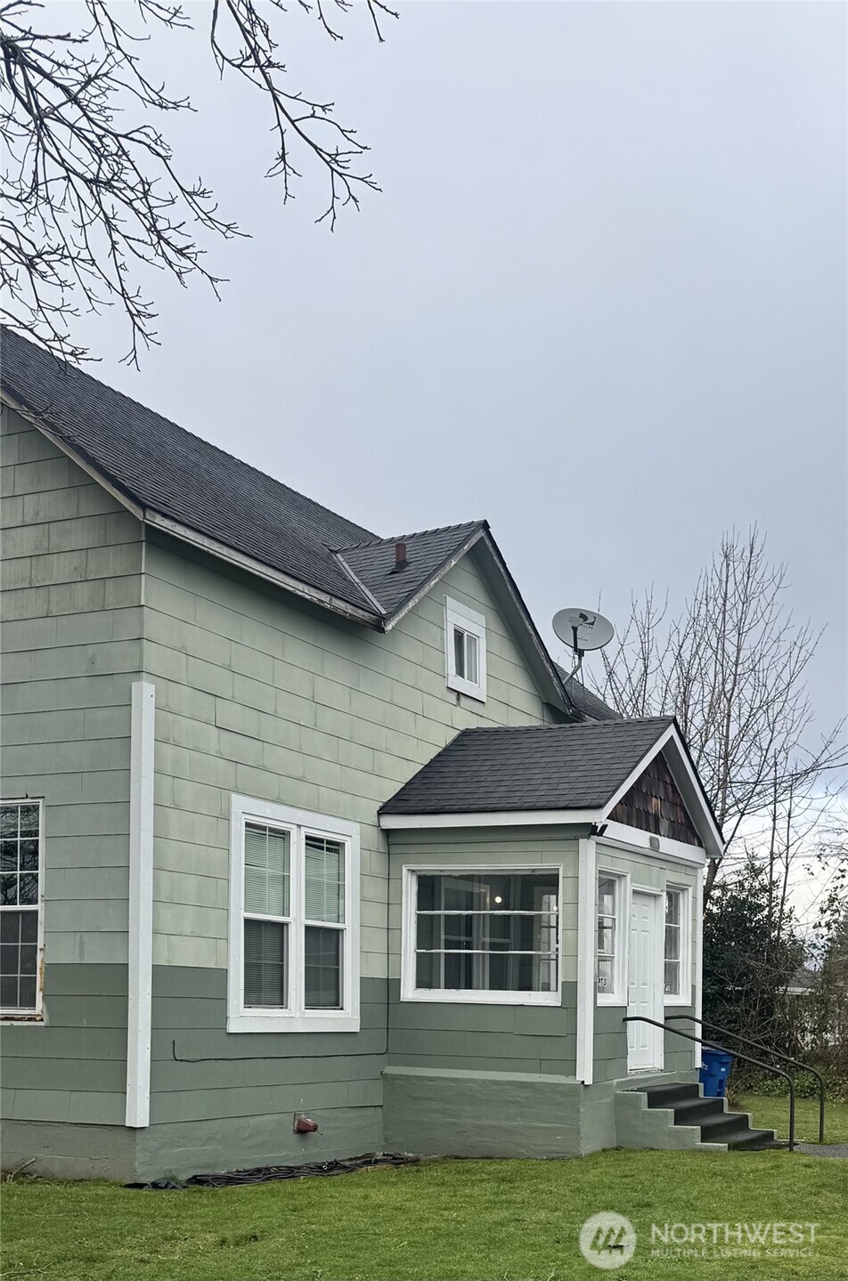1100 Borseth Street Sedro-Woolley, WA 98284 - Photo 2 of 21 a front view of a house with a garden