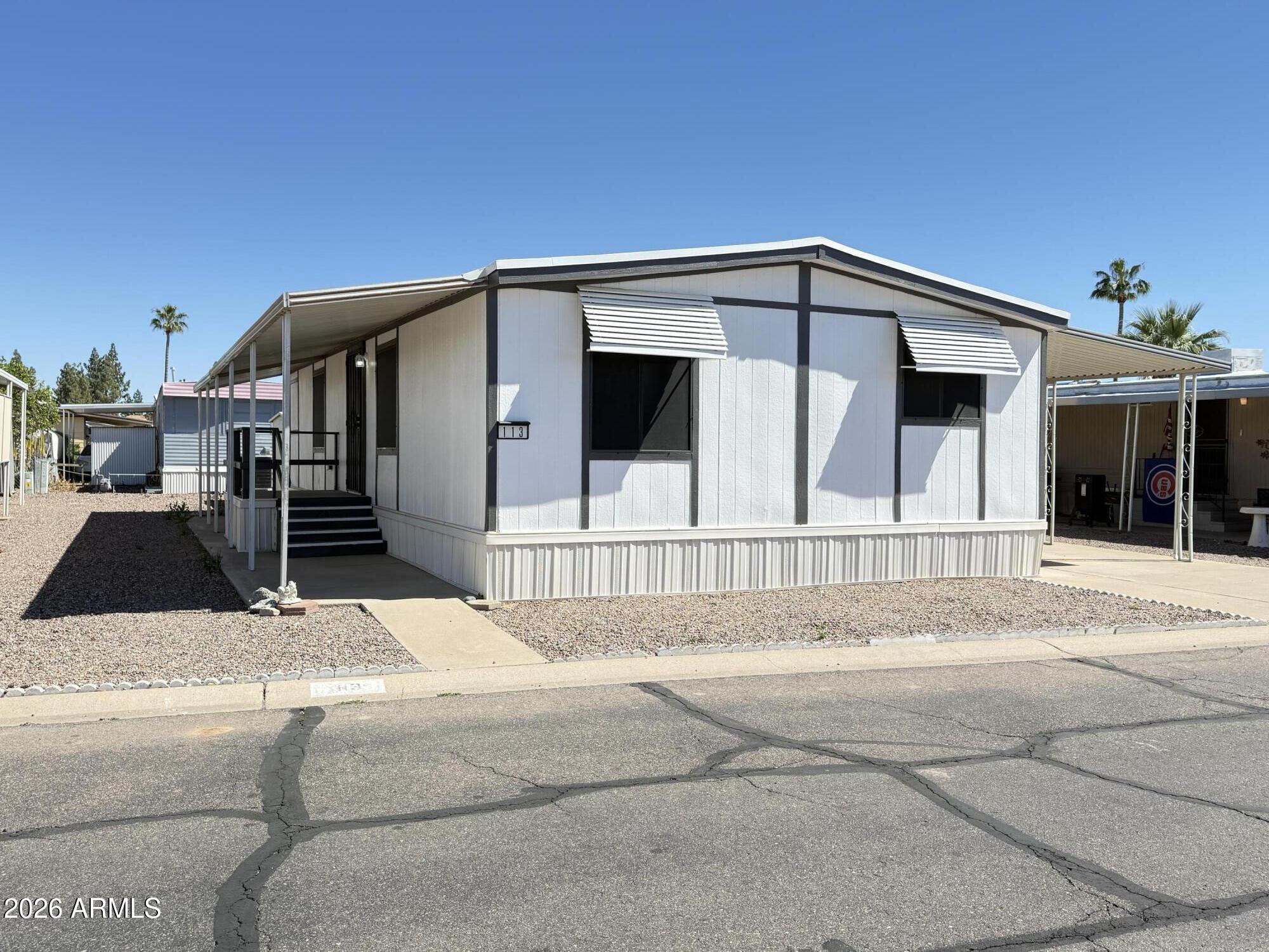 535 South Alma School Road, Unit 113 Mesa, AZ 85210 - Photo 1 of 41 a view of a house with a outdoor space