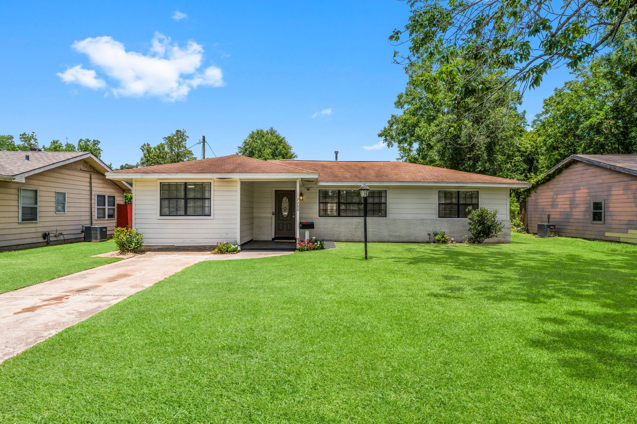 7280 Click Drive Beaumont, TX 77708 - Photo 2 of 39 a view of a house with a backyard
