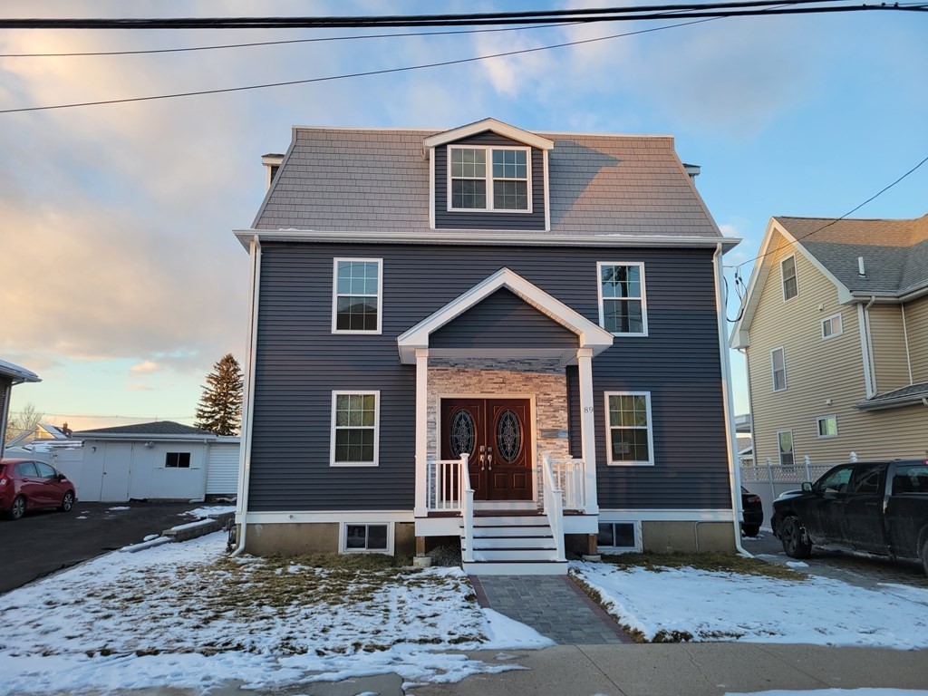 89 Devir Street Malden, MA 02148 - Photo 1 of 24 a front view of a house with garden