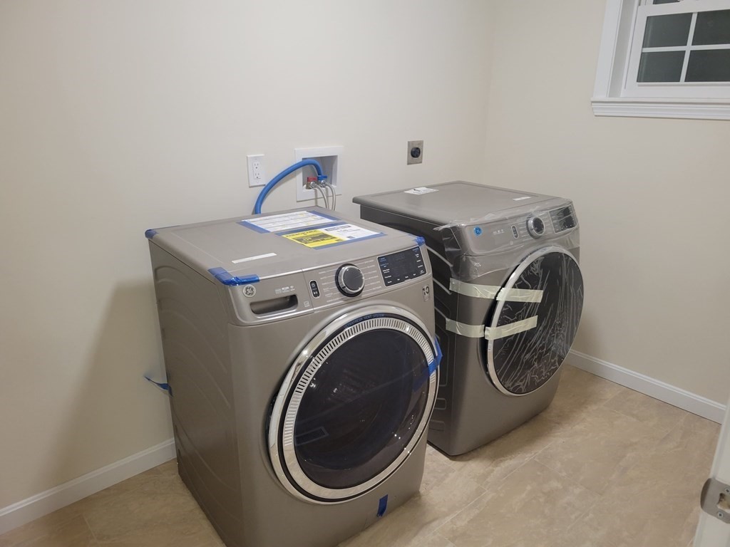 89 Devir Street Malden, MA 02148 - Photo 20 of 24 a utility room with dryer and washer