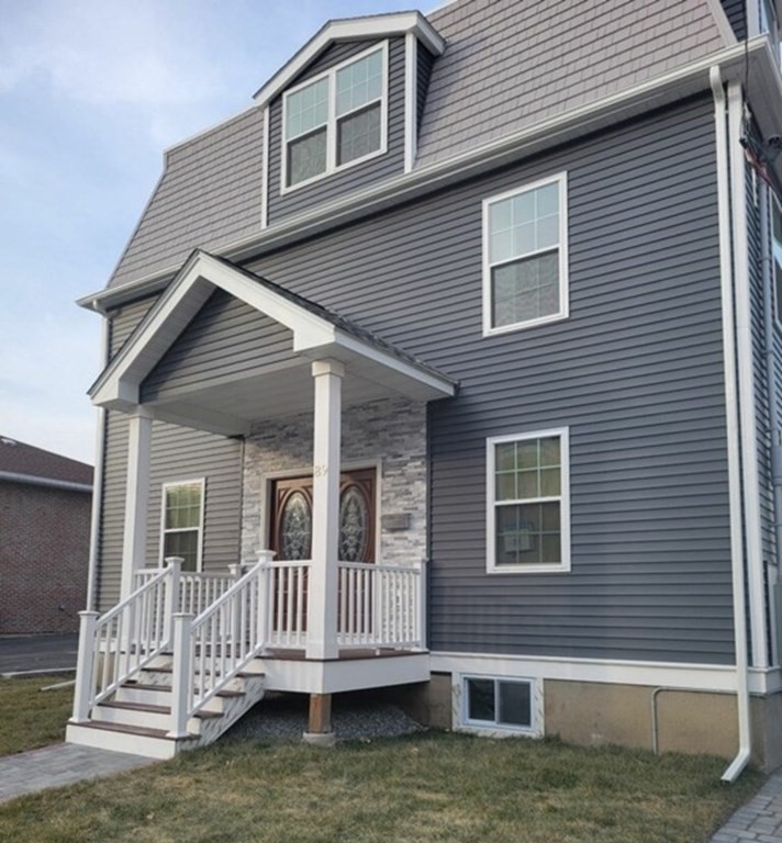 89 Devir Street Malden, MA 02148 - Photo 22 of 24 a front view of a house with a ocean view