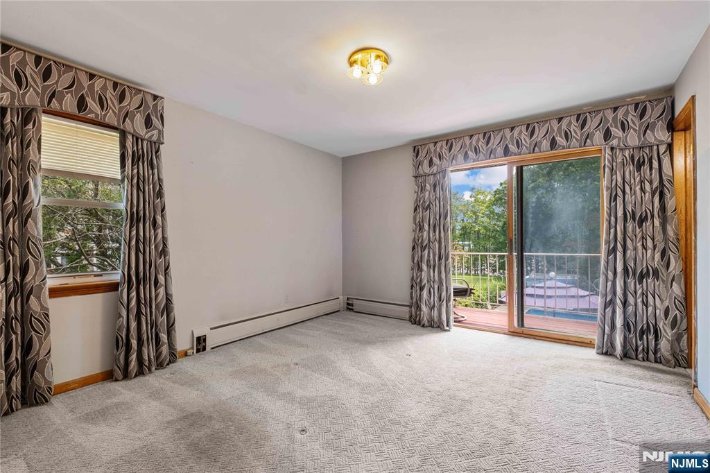 1468 Alps Road Wayne, NJ 07470 - Photo 13 of 36 a view of an empty room with a window