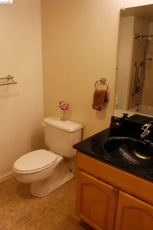 a bathroom with a toilet and a sink