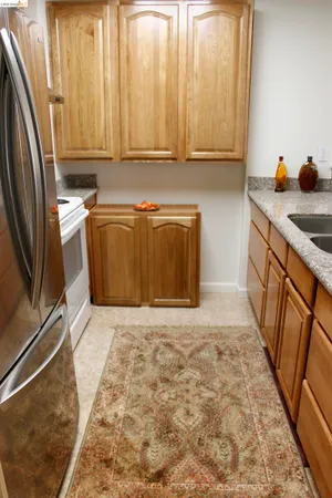 a bathroom with a sink a mirror and a shower