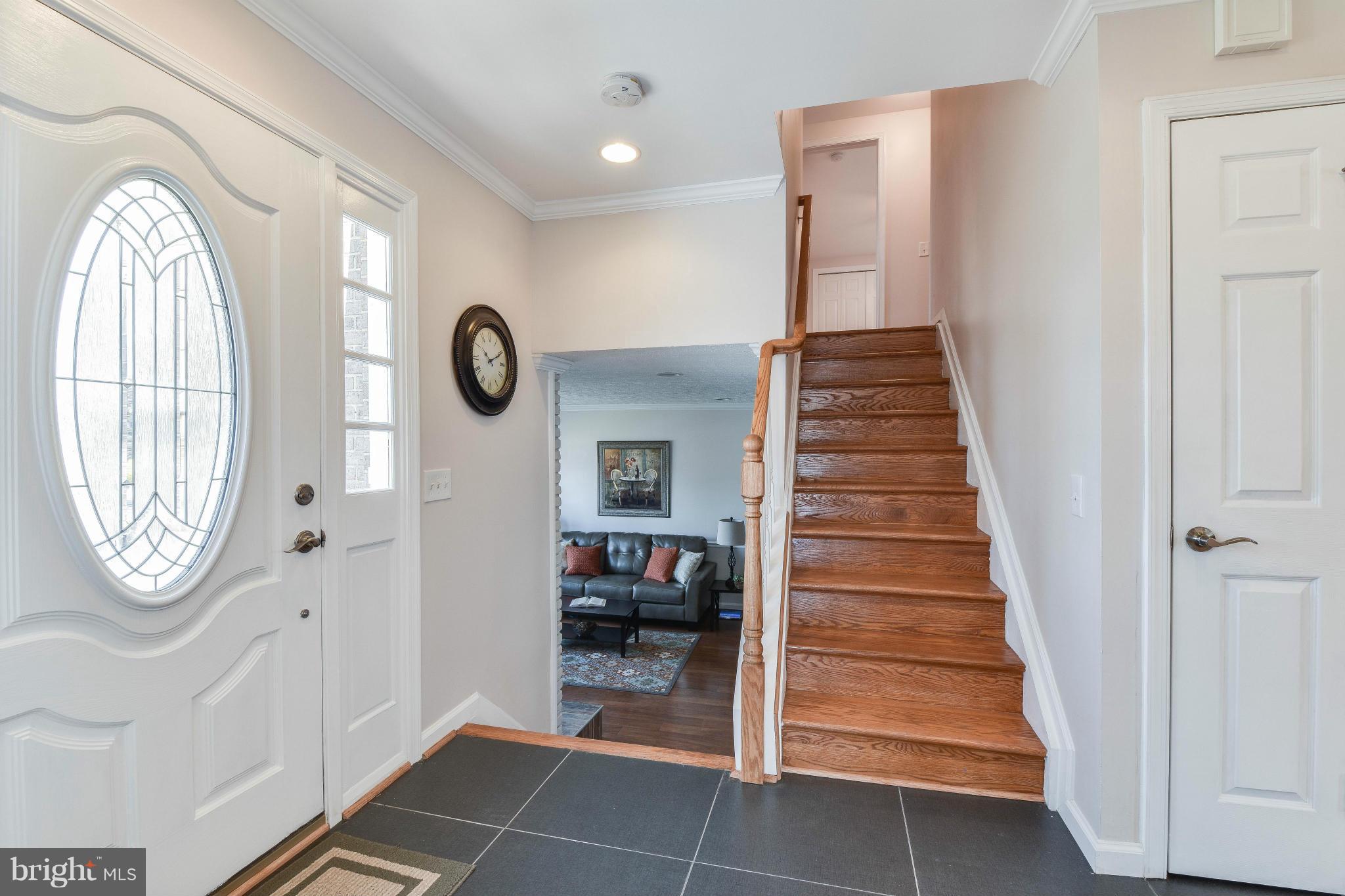 14001 Pond View Road Silver Spring, MD 20905 - Photo 2 of 30 a view of entryway with wooden floor