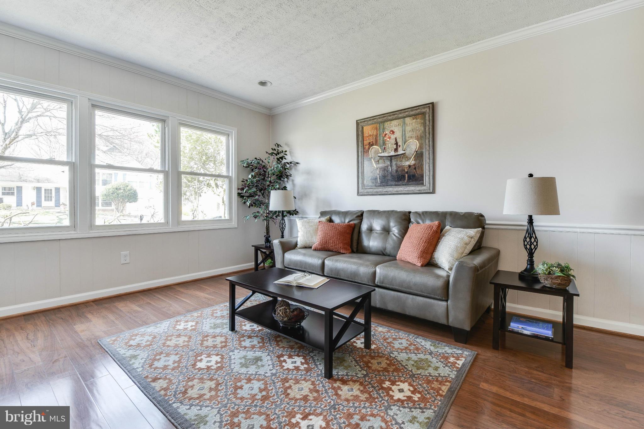 14001 Pond View Road Silver Spring, MD 20905 - Photo 11 of 30 a living room with furniture and a window