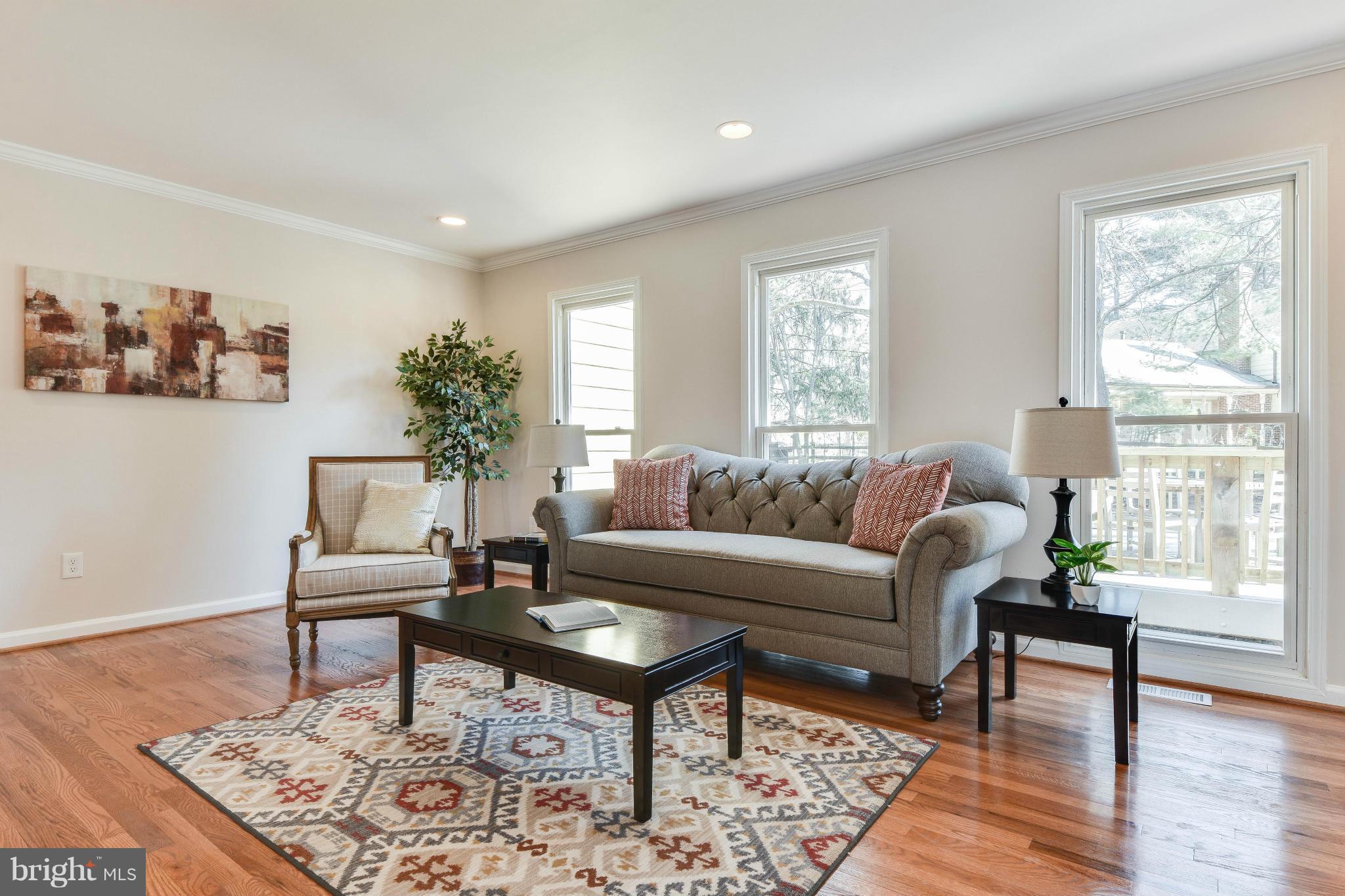 14001 Pond View Road Silver Spring, MD 20905 - Photo 3 of 30 a living room with furniture and wooden floor