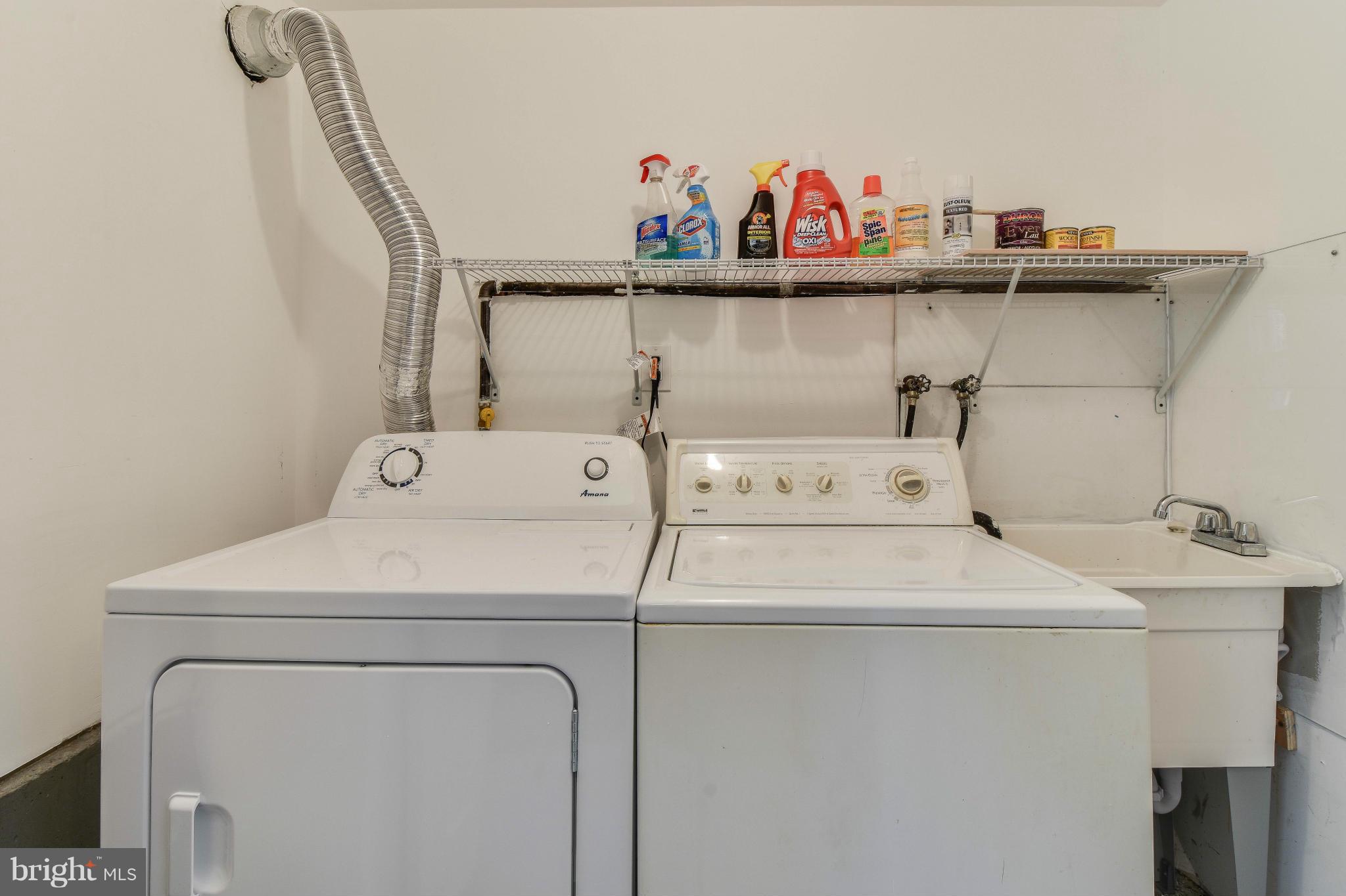 14001 Pond View Road Silver Spring, MD 20905 - Photo 23 of 30 a utility room with dryer and washer