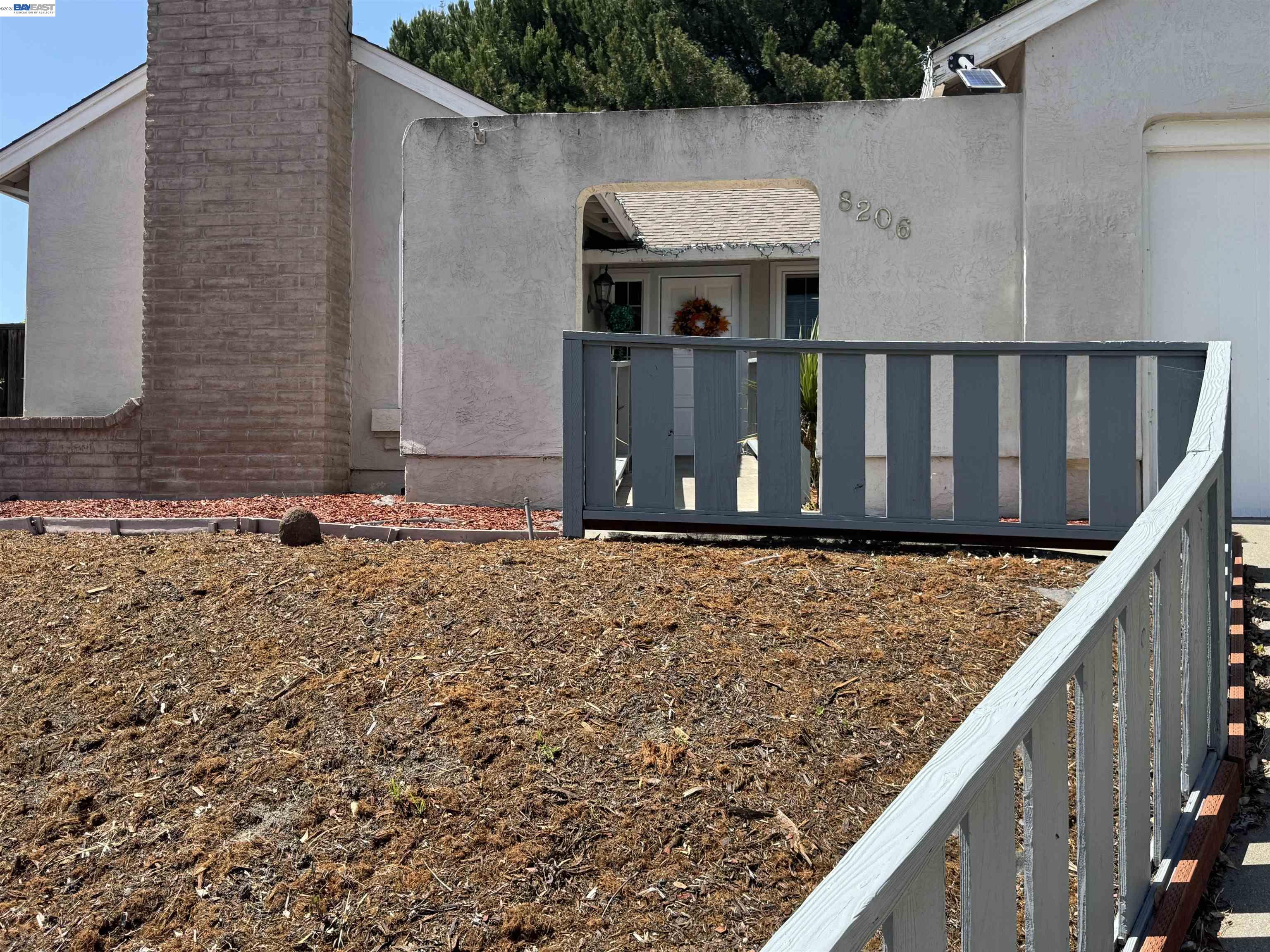 8206 Rhoda Avenue Dublin, CA 94568 - Photo 1 of 27 a view of wooden fence and a pathway