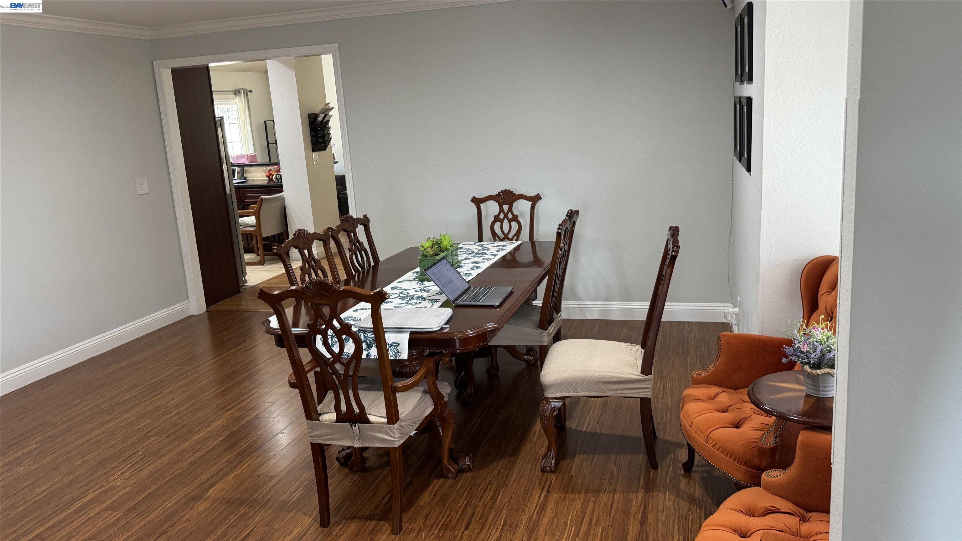 8206 Rhoda Avenue Dublin, CA 94568 - Photo 20 of 27 a dining room with furniture and wooden floor