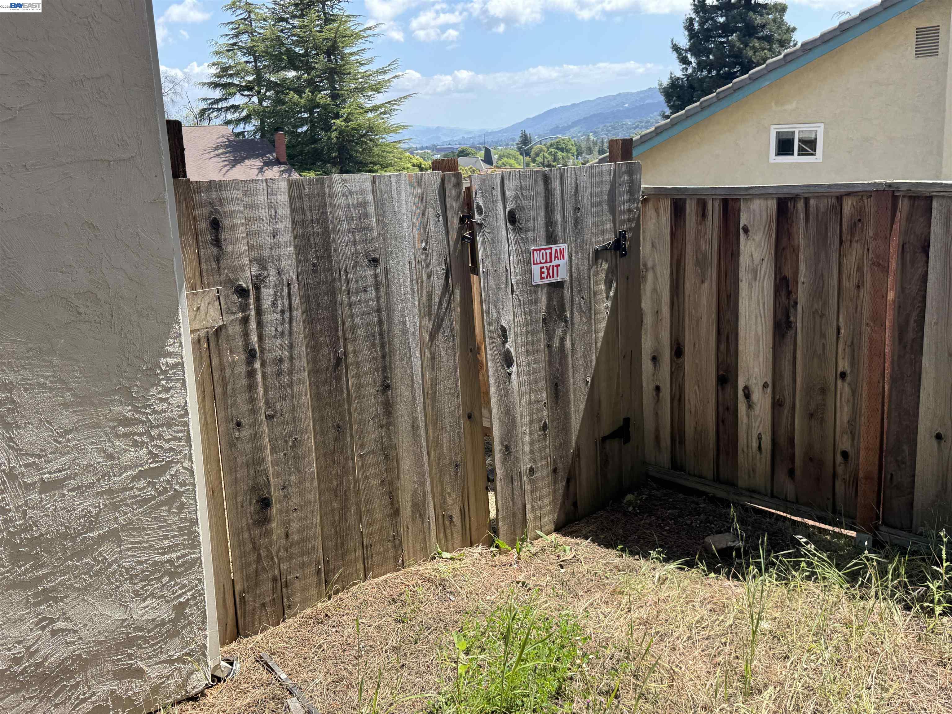 8206 Rhoda Avenue Dublin, CA 94568 - Photo 9 of 27 a view of walk in closet with wooden fence