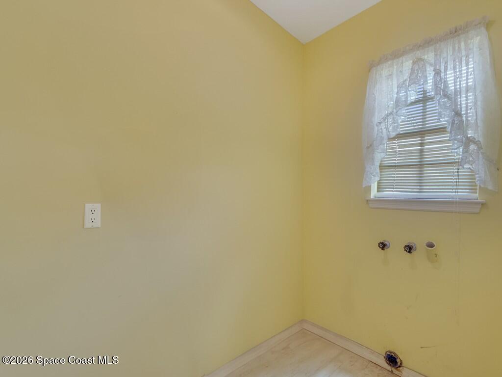 167 Deer Run Road Palm Bay, FL 32909 - Photo 18 of 36 a view of a small space with window and a bathroom