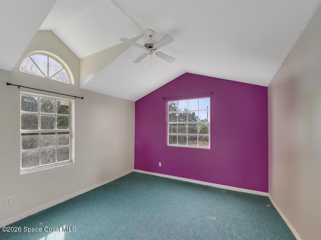 167 Deer Run Road Palm Bay, FL 32909 - Photo 26 of 36 a view of an empty room with a window