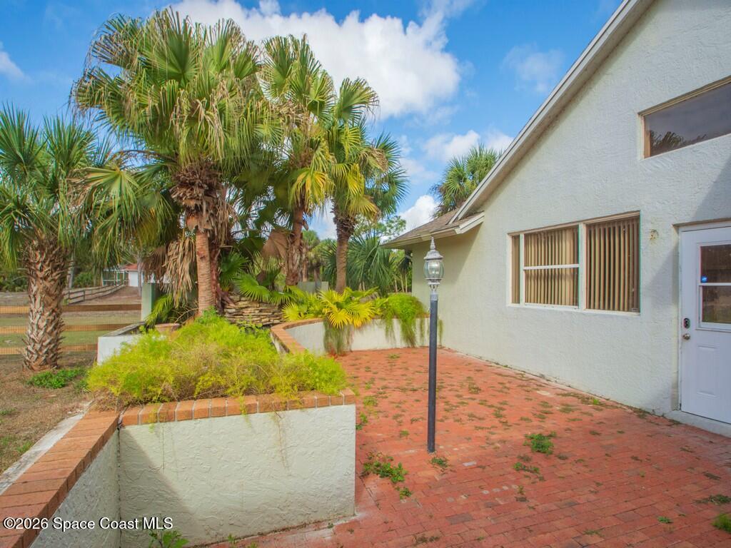 167 Deer Run Road Palm Bay, FL 32909 - Photo 29 of 36 a view of outdoor space and yard